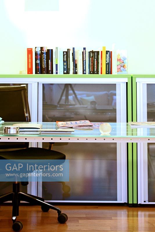Modern glass cupboards in study