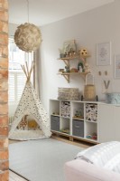 Open plan playroom with teepee