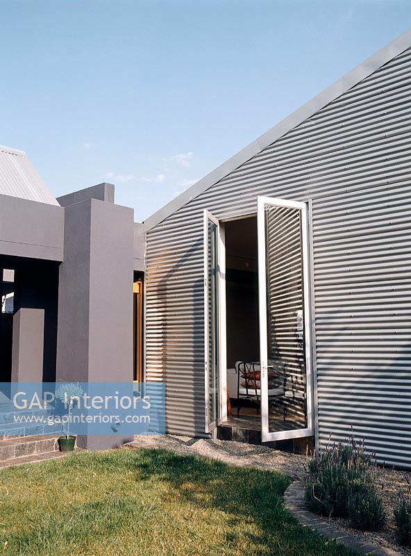 Gap Interiors Modern Home Facade With Corrugated Iron Wall