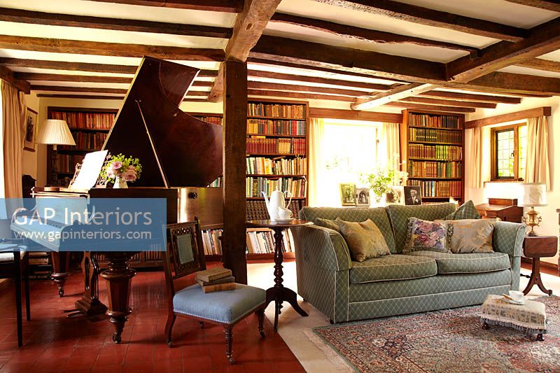 Country living room with grand piano