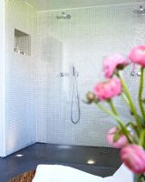 Contemporary bathroom with double shower 