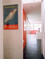 Hallway and a vintage add for a cruise ship