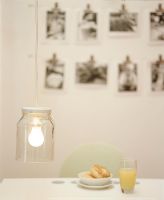 Breakfast on a table with a low hanging lamp