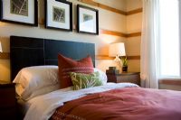 Decorative pillows on contemporary bed