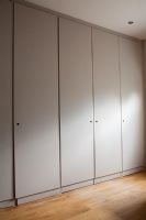 Wall of fitted cupboards 