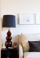 Lamp on side table in modern living room 
