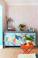 Colourful modern sideboard in living room 