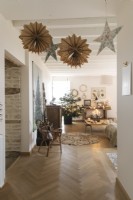 View into country living room decorated for Christmas 