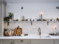 Modern country style kitchen with shelving and Christmas details