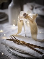 Decorative place setting ribbon and dried flower detail