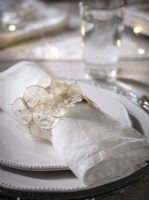 Decorative place setting with dried flower napkin ring 